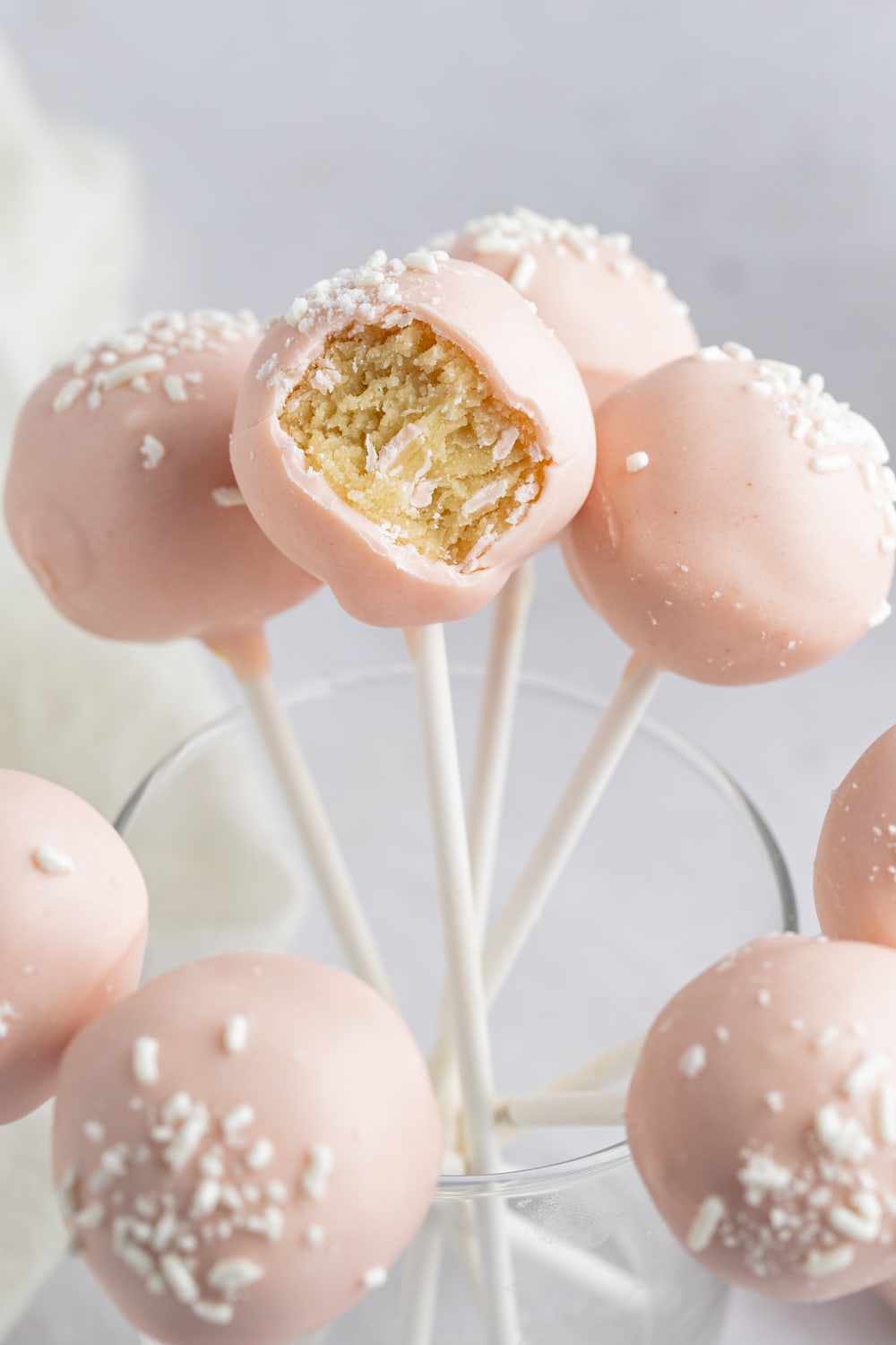 Pink Coated Starbucks Cake Pops Standing In A Glass