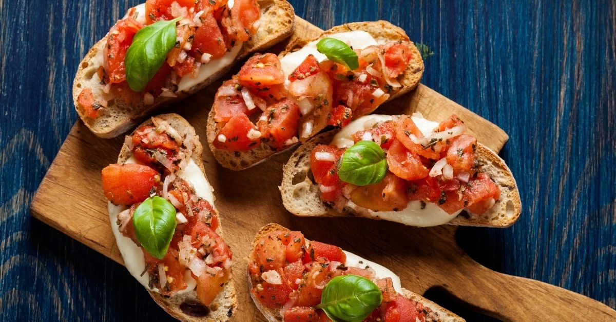 Appetizing Bruschetta with Tomatoes, Cheese and Basil