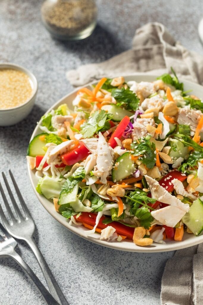 The best lettuce recipes you can find online! Asian Salad shown in photo with Chicken, Carrots, Sesame Seeds and Lettuce.
