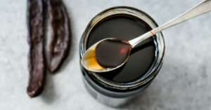 Black Molasses in a Small Glass Jar