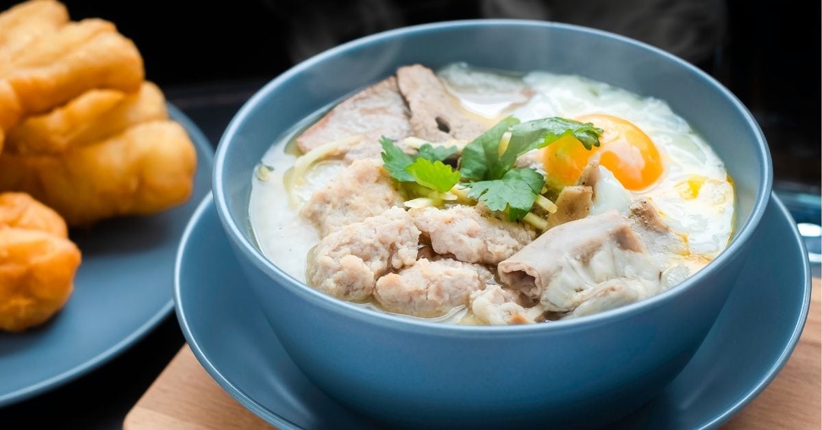 Bowl of Congee with Pork and Egg Toppings