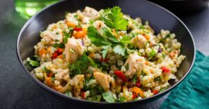 Bowl of Homemade Barley Salad with Chicken and Vegetables