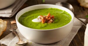 Bowl of Homemade Pea Soup with Cream, Celery and Bacon