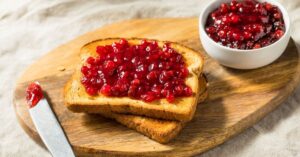 Bowl of Lingonberry Jam with Toasted Bread