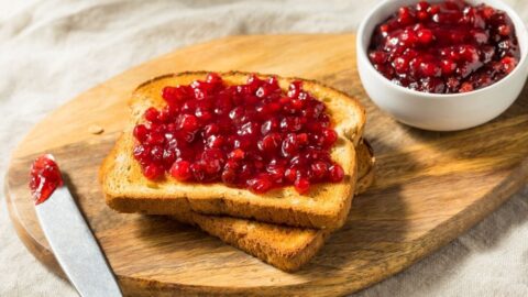 Bowl of Lingonberry Jam with Toasted Bread
