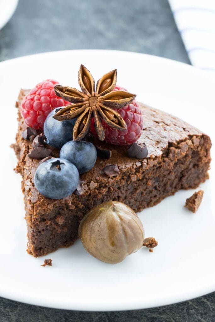 Slice of Flourless Chocolate Cake with Berries