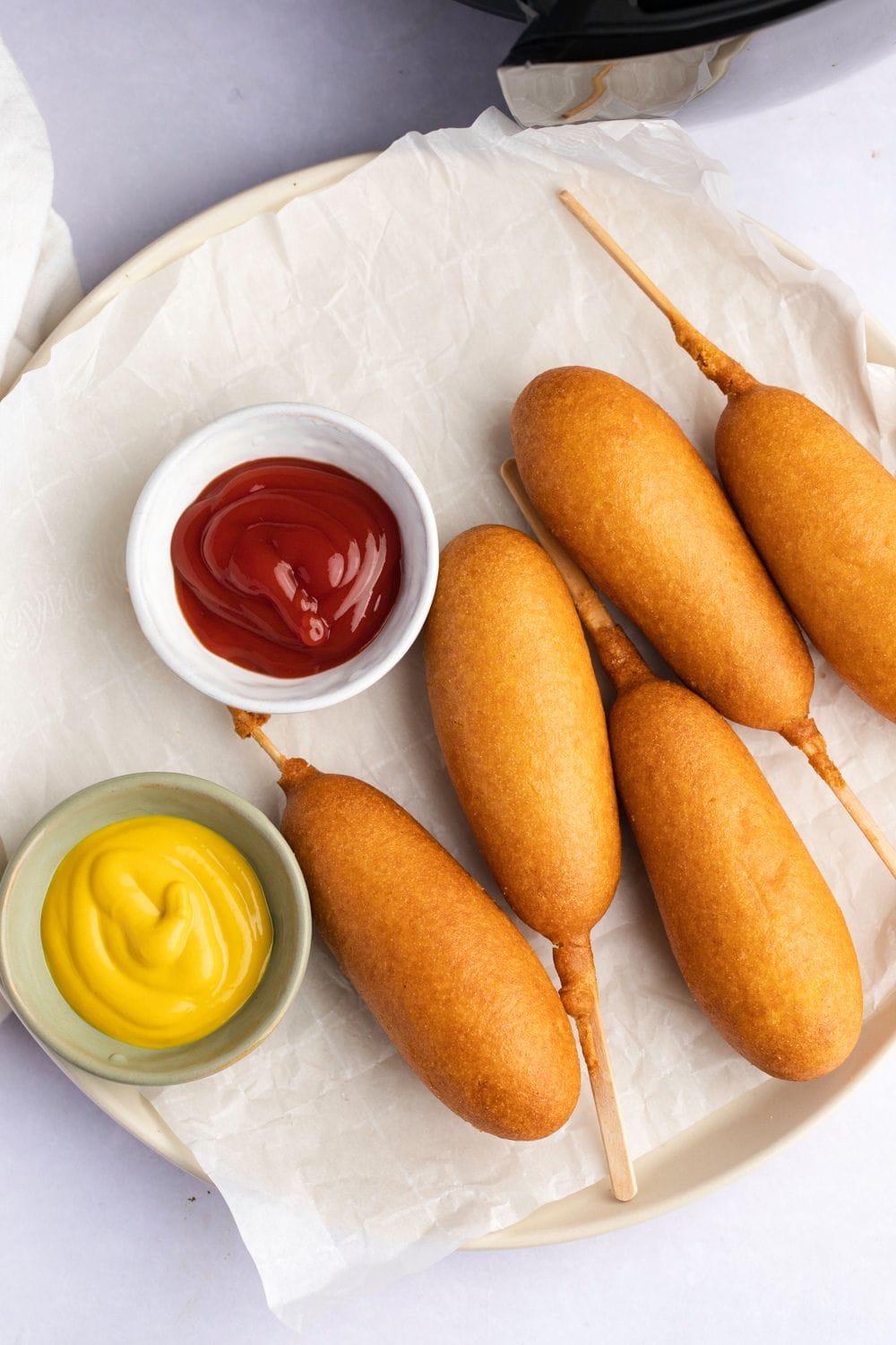 Homemade Air Fryer Corn Dogs with Ketchup and Mustard