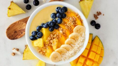 Homemade Breakfast Smoothie bowl with Blueberries, Mangoes, Oats and Bananas