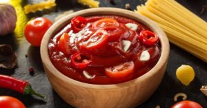 Homemade Chili Tomato Sauce in a Wooden Bowl