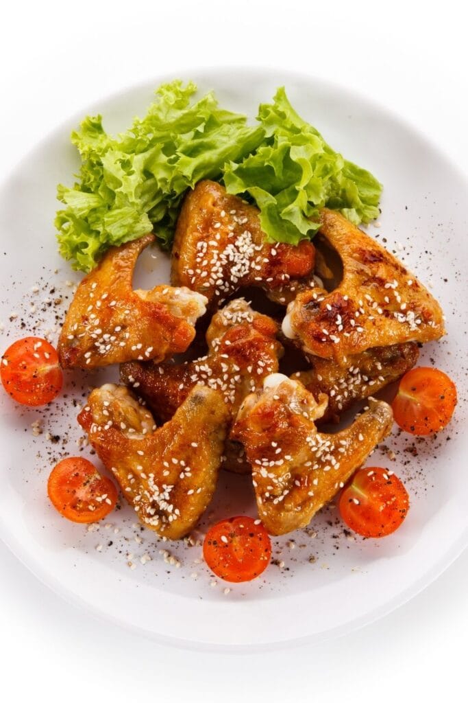 Homemade Grilled Turkey Wings with Cherry Tomatoes and Sesame Seeds