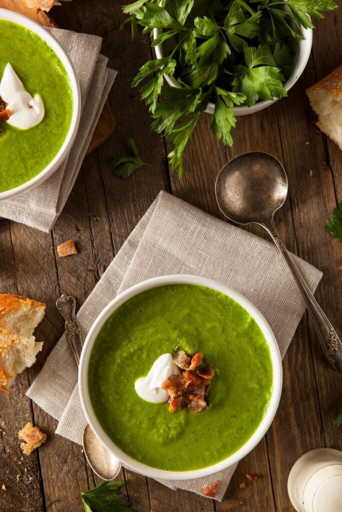 These celery recipes will make you fall for the undervalued vegetable! Homemade pea soup with celery, bacon and  cream shown in picture.