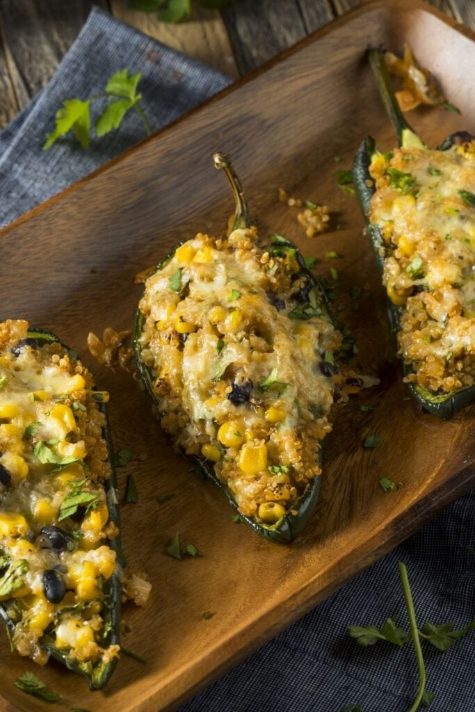 25 Poblano Pepper Recipes For Dinner Tonight! Shown in picture: Quinoa Stuffed Poblano Peppers with Corn and Beans