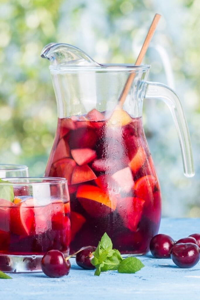 Sangria Punch Cocktail with Apple, Orange and Cherries