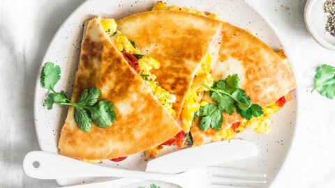 Scrambled Eggs and Ham Quesadillas with Vegetables for Breakfast