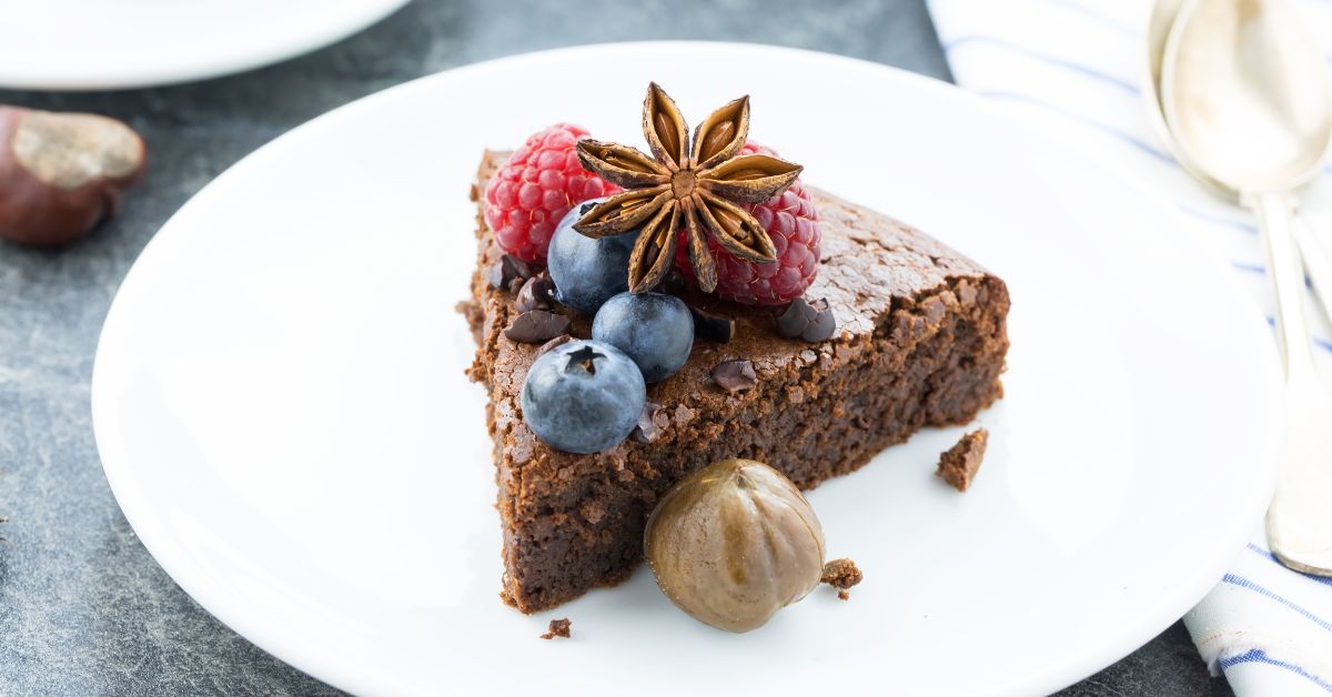 Slice of Homemade Flourless Chocolate Cake with Berries