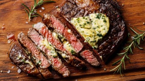 Sliced Butter Garlic Steak in a Wooden Board