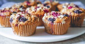 Soft and Fluffy Oatmeal Banana Muffins with Mixed Berries