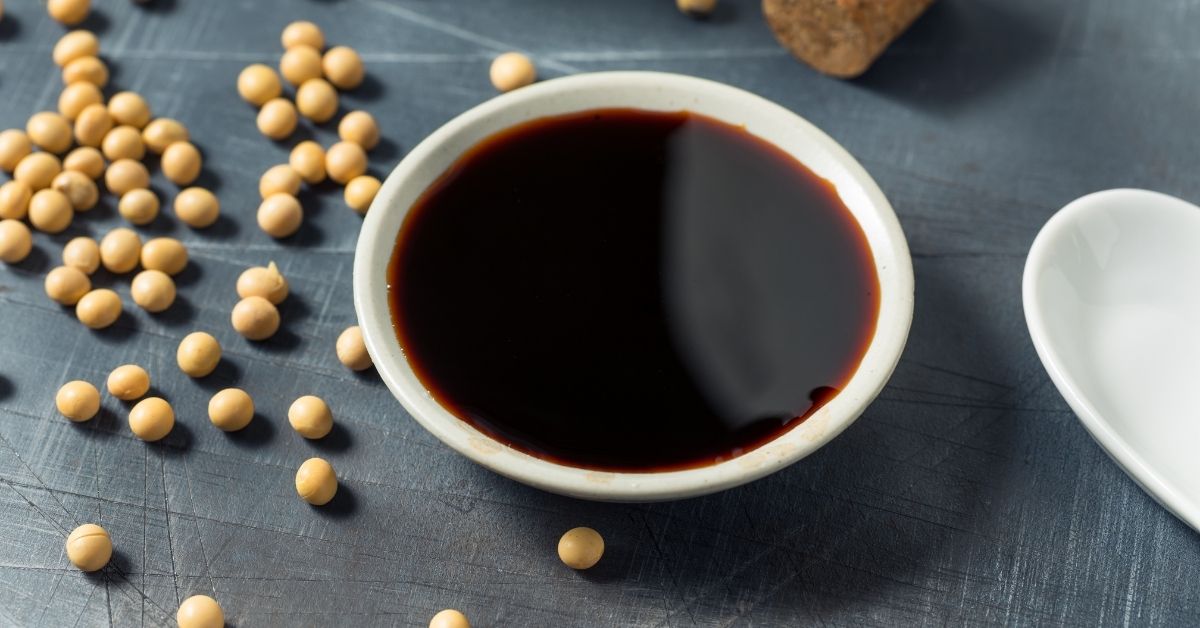 Soy Sauce in a Small Container with Soy Beans