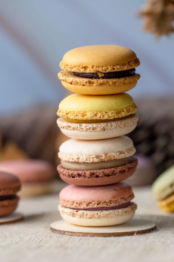 Sweet Assorted Macarons with Different Flavors: Strawberry, Chocolate and Lemon