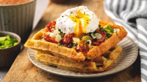Tasty Poached Egg on Belgian Waffle