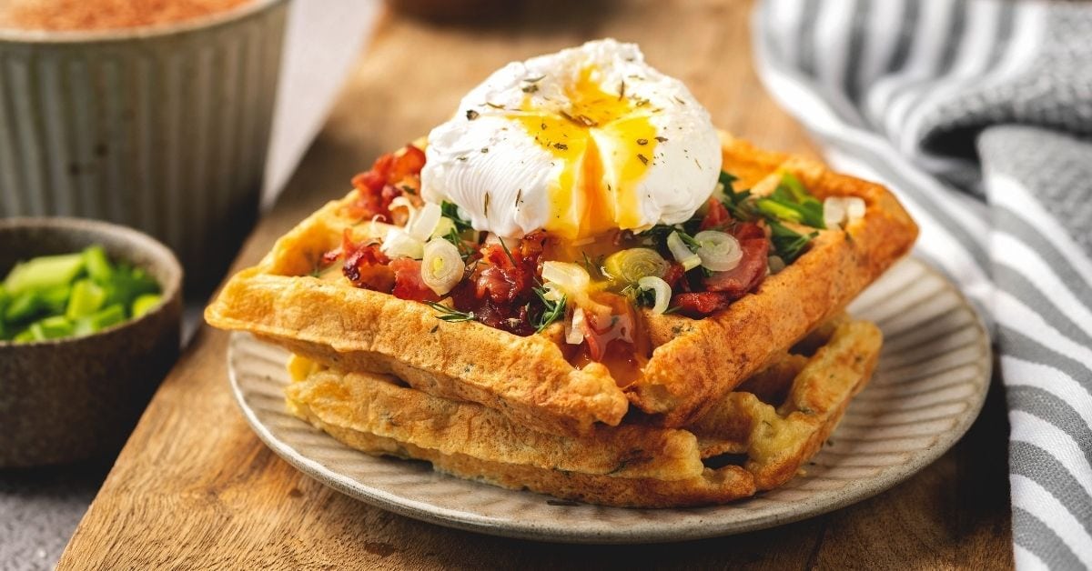 Tasty Poached Egg on Belgian Waffle