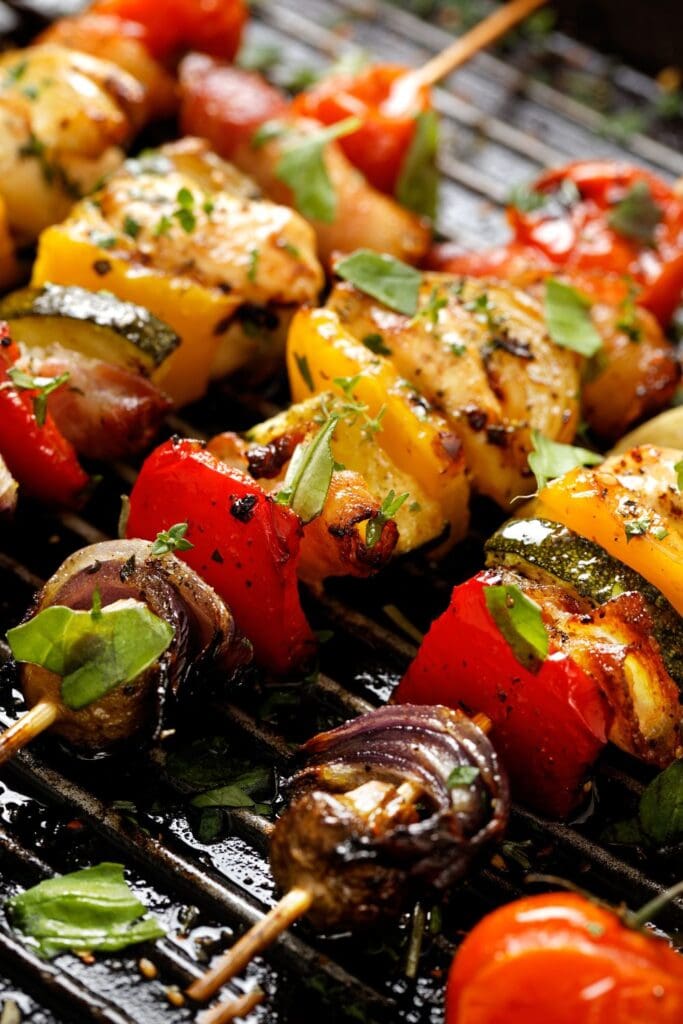Pool Party Foods featuring Grilled Vegetable and Meat Skewers on the BBQ