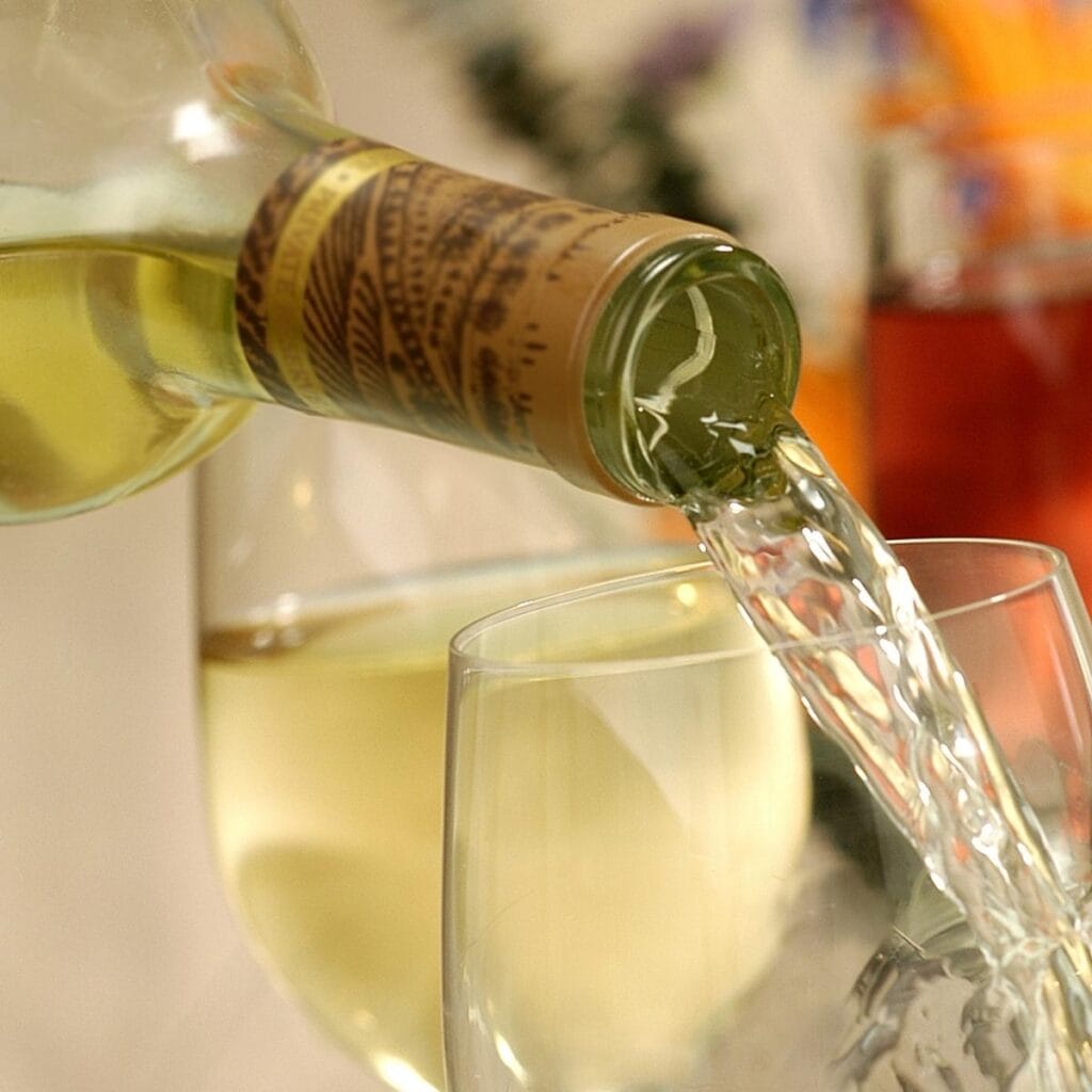 White Wine Poured in a Glass
