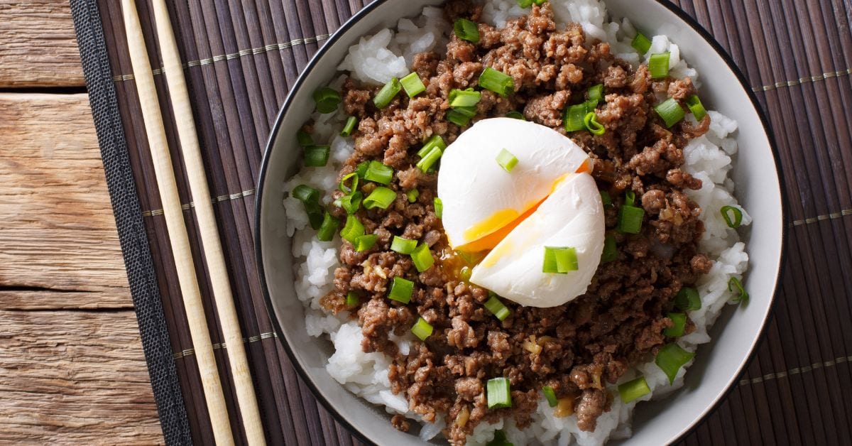 Bowl of Ground Beef and Rice with Egg and Green Onions