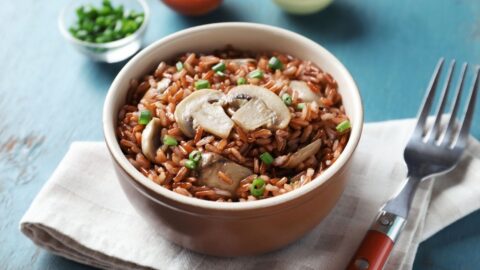 Bowl of Homemade Brown Rice with Mushrooms and Green Onions