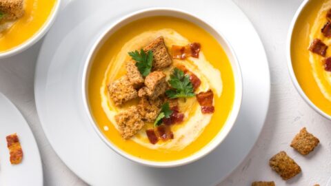Bowl of Kabocha Squash Soup with Bacon and Crotouns