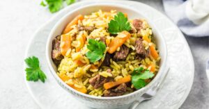 Bowl of Wild Rice Pilaf with Carrots and Beef