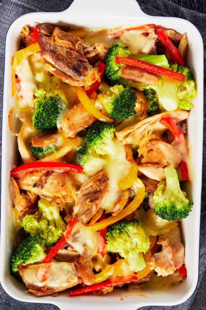 Broccoli and Chicken Casserole with Peppers in a Baking Dish