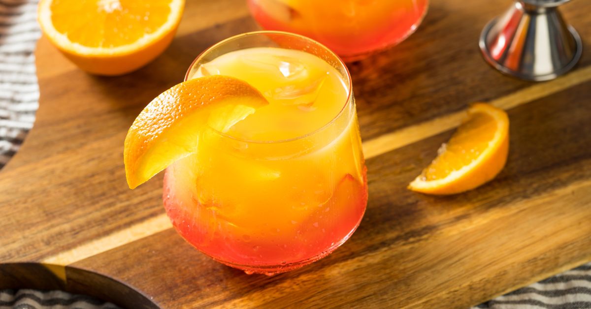 Cold Boozy Tequila Sunrise Cocktail with Oranges