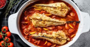 Cooked Monkfish with Tomatoes in a Baking Dish