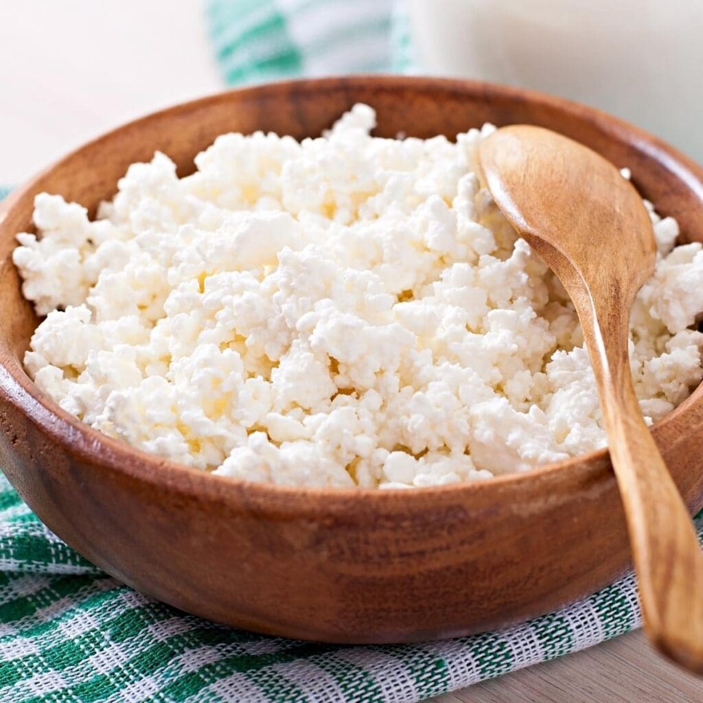 Cottage Cheese in a Wooden Bowl