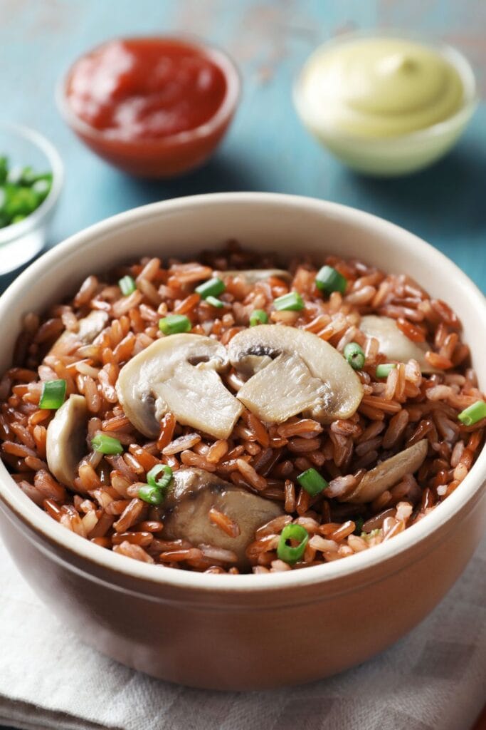 Homemade Brown Rice with Mushrooms in a Bowl