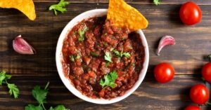 Homemade Mexican Salsa with Chips in a Bowl