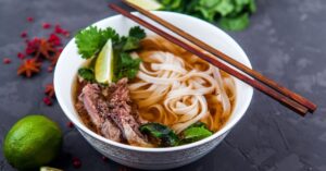 Homemade Pho Bo: Vietnamese Rice Noodle Soup with Beef
