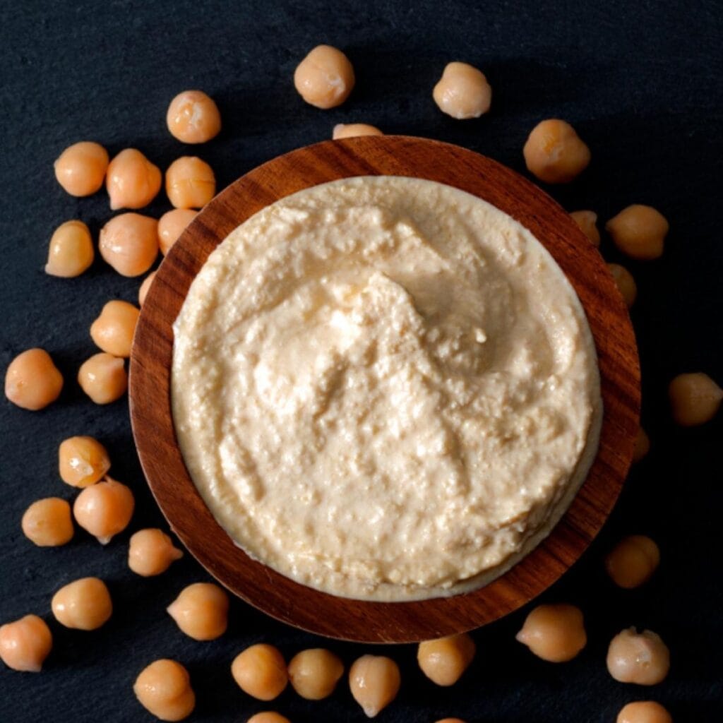 Hummus on A Wooden Bowl