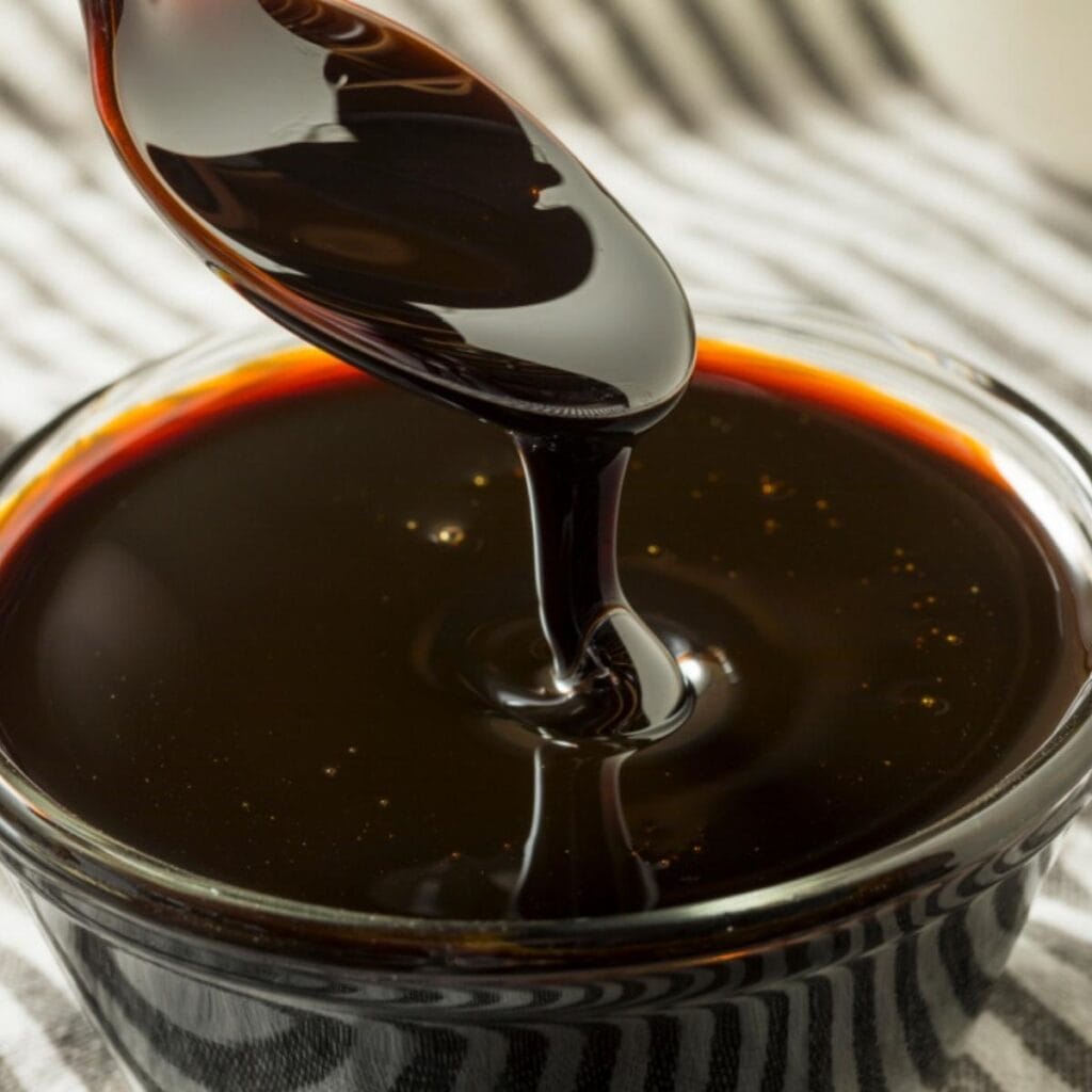Thick Molasses on a Glass Dish
