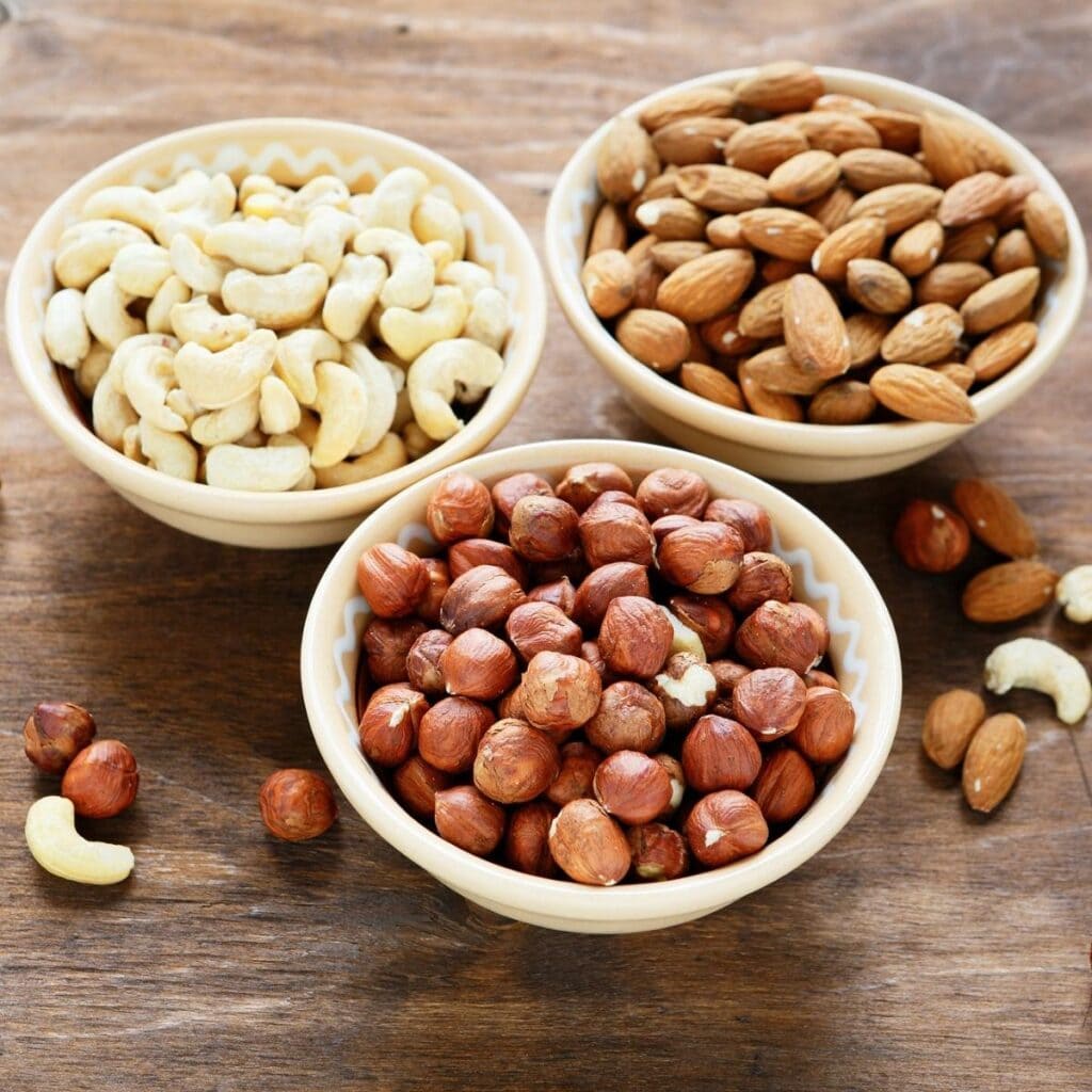 Different Types of Nuts and Seeds on a White Bowl