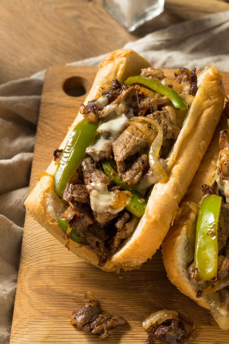 20 Best Shaved Beef Recipes Easy Steak Dishes Insanely Good   Philly Cheesesteak With Beef And Pepper 768x1152 