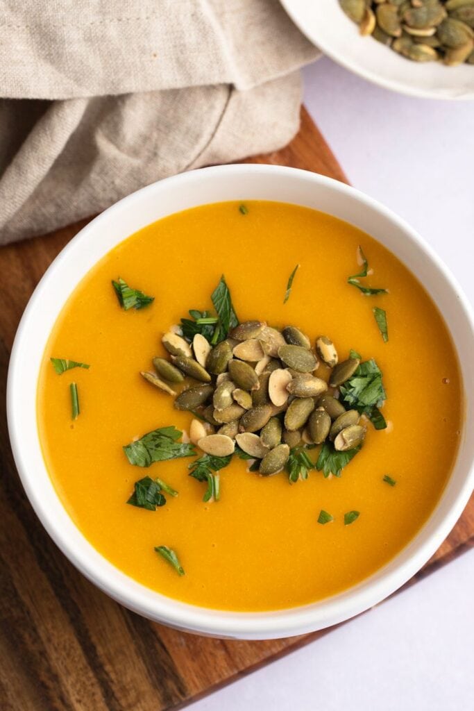 Rich and Cozy Butternut Squash Soup in a White Bowl