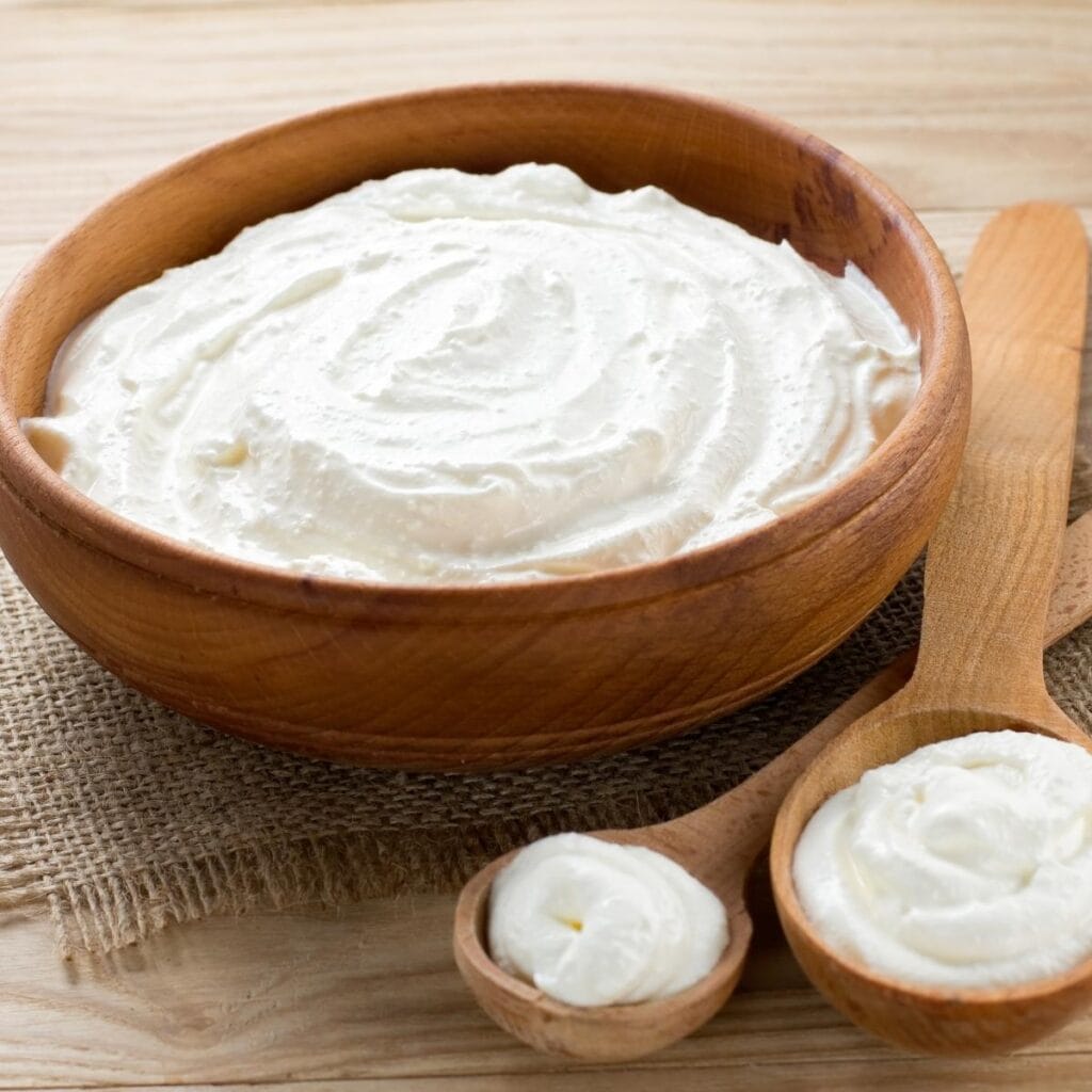 Sour Cream in  a Wooden Round Dish