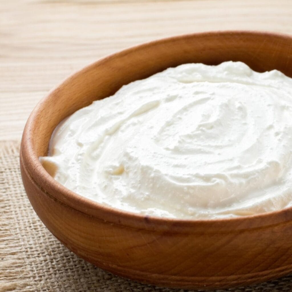 Sour Cream in a Wooden Dish