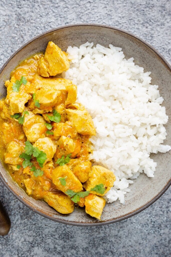 Spicy Chicken Curry with Rice and Fresh Coriander