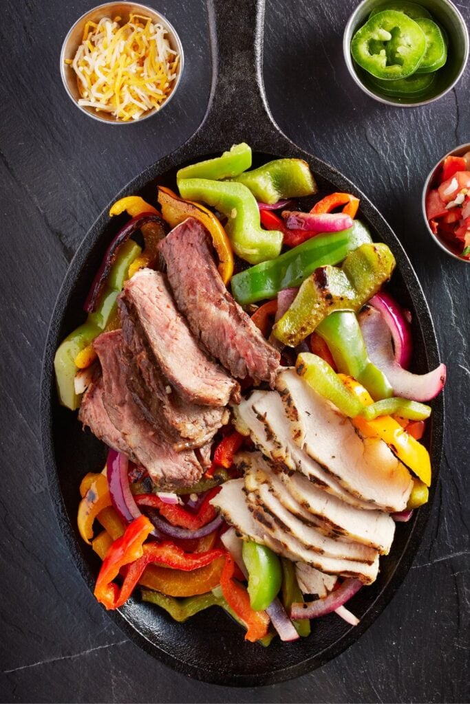 Spicy Chicken and Steak Fajitas with Bell Peppers