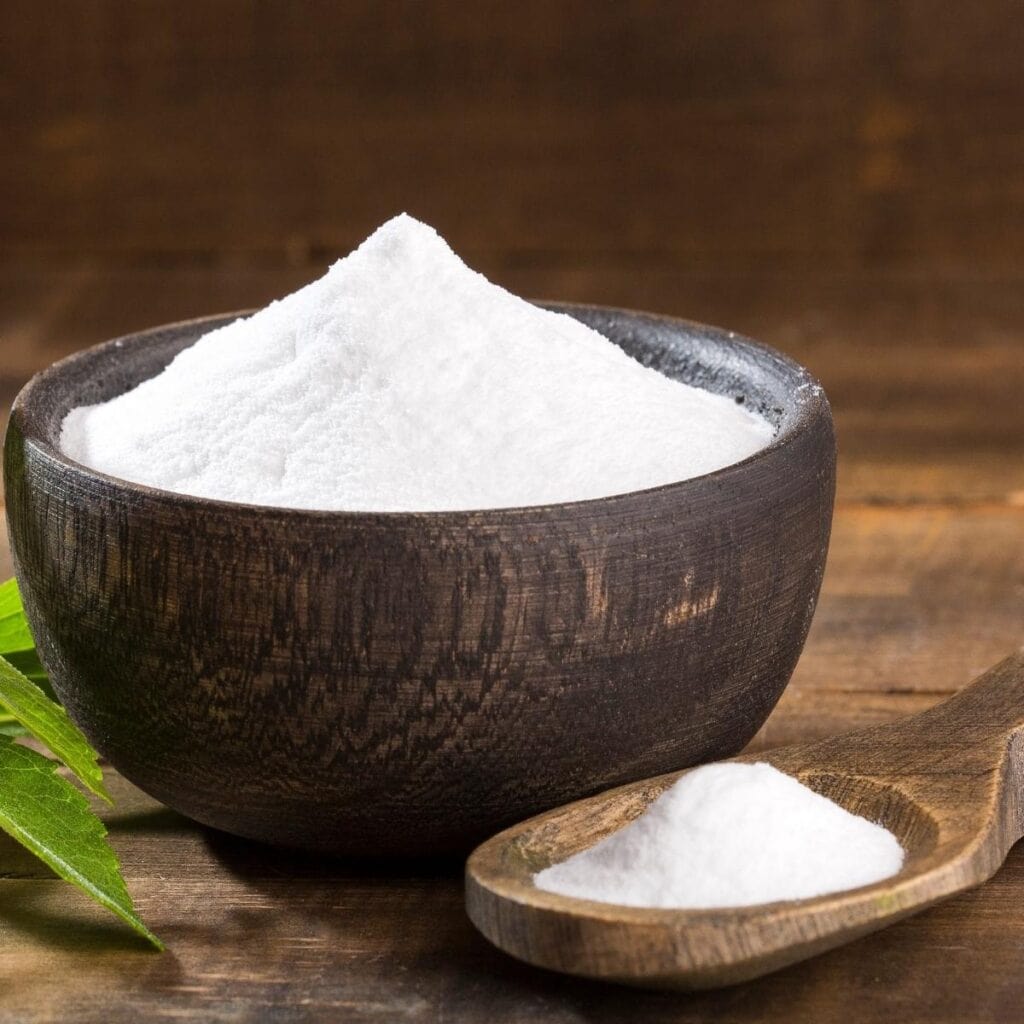 Powdered Stevia on a Wooden Bowl