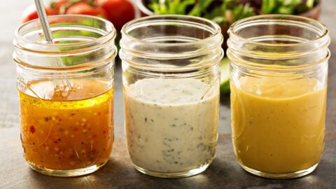Variety of Homemade Salad Dressing in Mason Jars Including Vinagrette, Ranch and Honey Mustard
