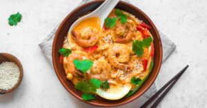 Warm Homemade Shrimp Soup with Noodles and Herbs
